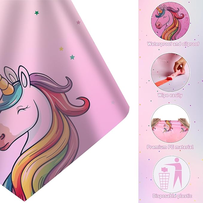 Pink unicorn tablecloth corner close-up with rainbow unicorn face and small stars