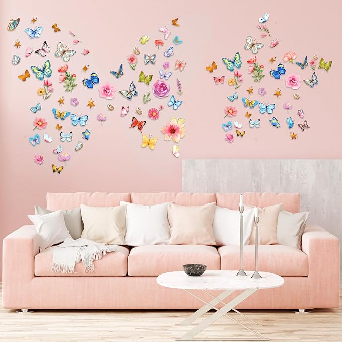 Glow-in-the-dark butterfly and flower wall decals arranged across a wall above a sofa