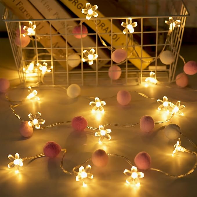 Cherry blossom string lights with pink pom poms and warm flower LEDs, battery powered