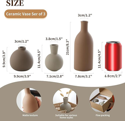 Ceramic vase set of 3 with matte tan, white, and dark brown vase shapes