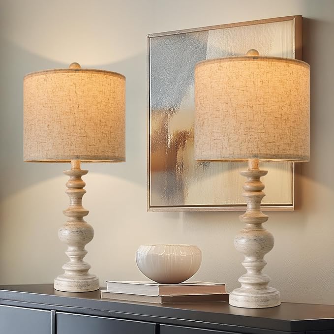 Set of two farmhouse table lamps with beige linen shades and whitewashed resin pedestal bases