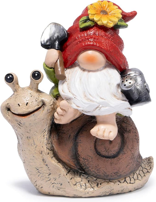 Garden gnome figurine with red hat and white beard, holding a frog-like creature