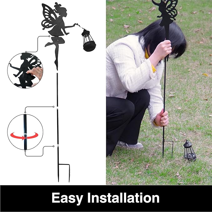 Black metal fairy stake solar lanterns set in ground with hanging lantern tops