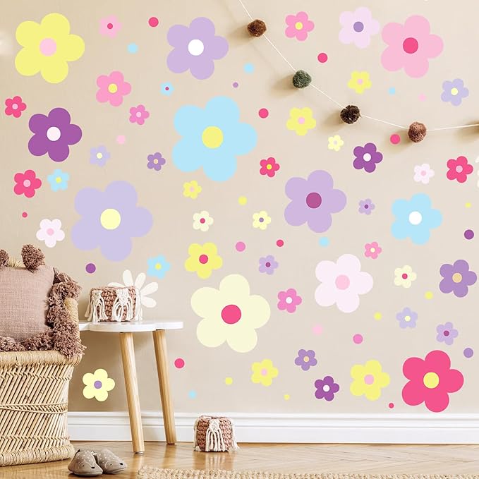 Installed glow-in-the-dark flower wall decals in pastel and bright colors with tiny dot details