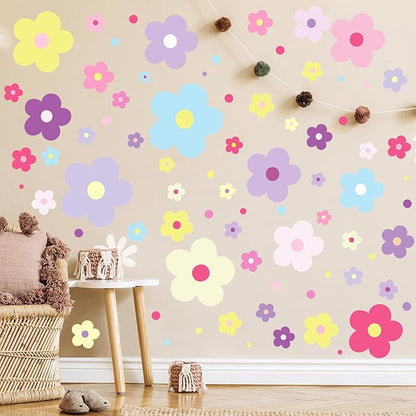 Installed glow-in-the-dark flower wall decals in pastel and bright colors with tiny dot details