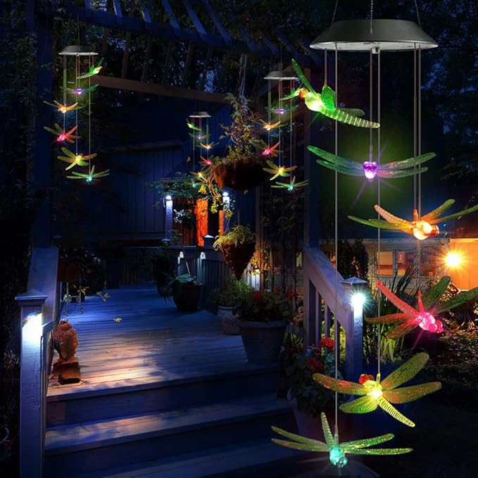 Garden patio solar wind chimes with glowing dragonfly charms hanging from a metal lantern top
