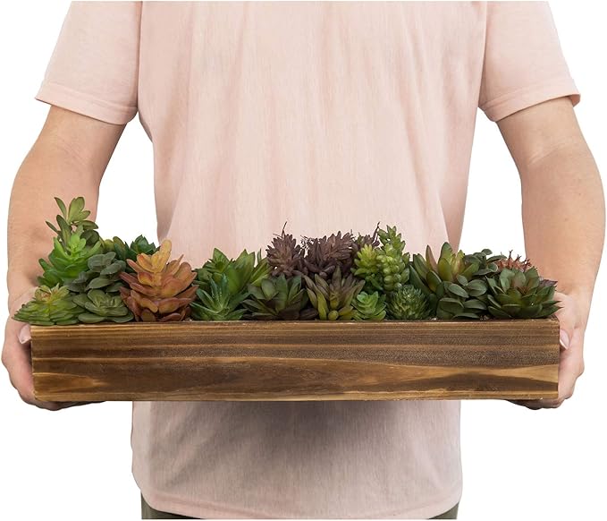 Faux succulent planter in rustic brown wood held by two hands, long rectangular tray