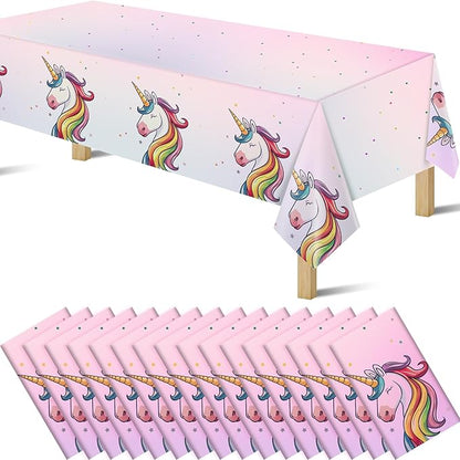 Unicorn plastic tablecloth with pink background, rainbow-maned unicorns and star dots