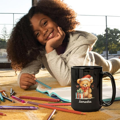 Black mug with teddy bear Santa hat design and name 'samantha' on front