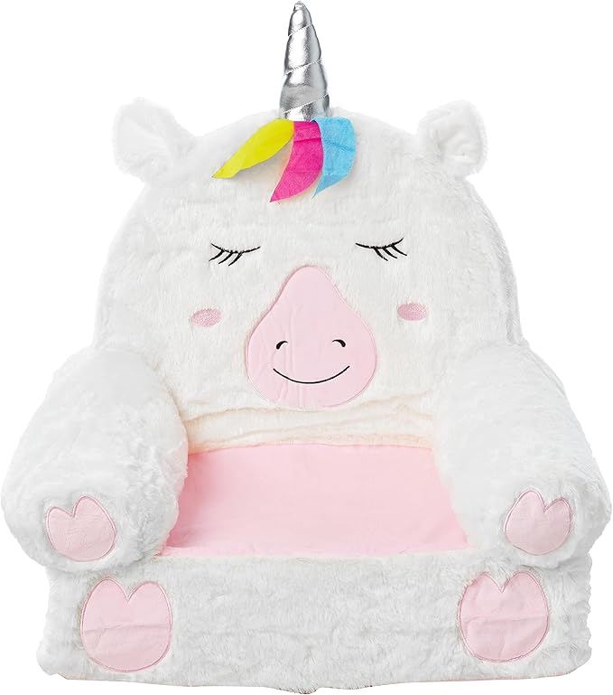 Unicorn plush toddler chair in white with pink seat panel, smiling face, rainbow mane and horn