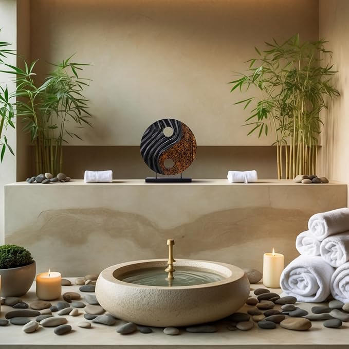 Wooden yin yang sculpture with black ridged texture and brown speckled panel on a base