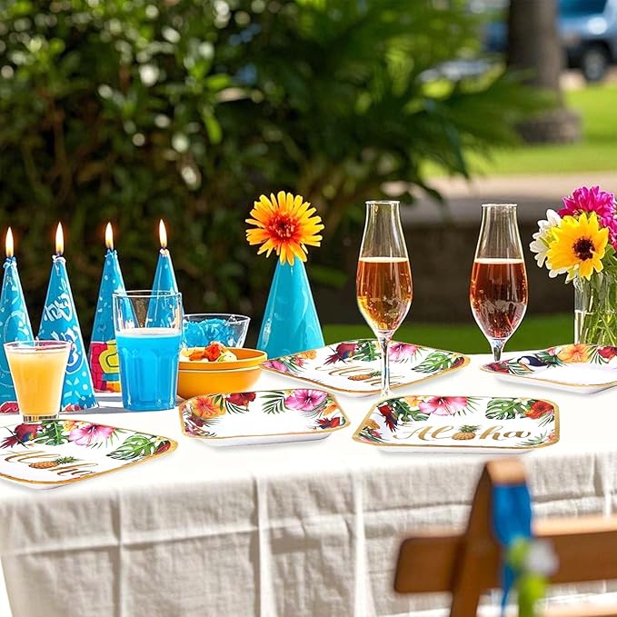 Hibiscus and palm leaf party plates and napkins set for outdoor dining