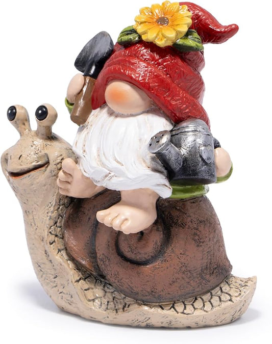 Garden gnome figurine with red hat flower, white beard, holding a frog and small gray creature