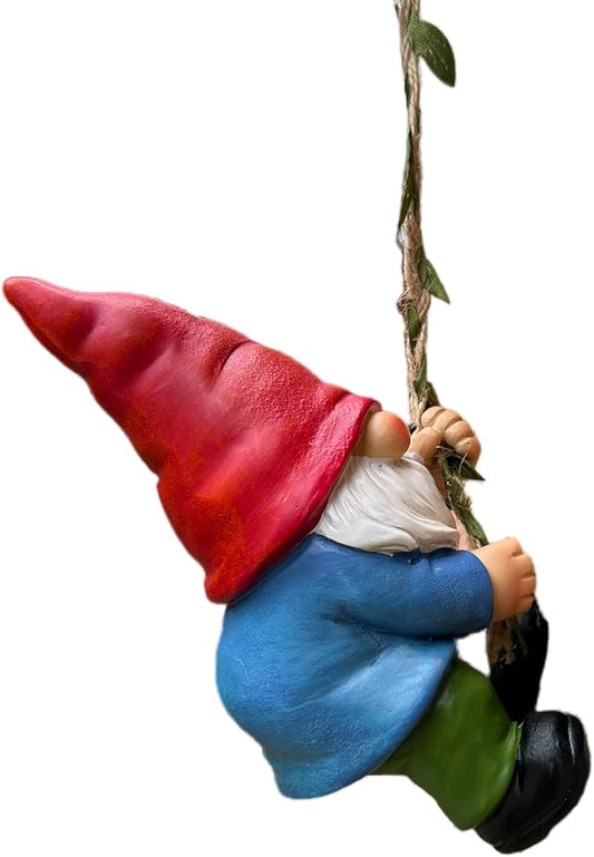 Climbing gnome garden statue on rope, red hat, white beard, blue body, green pants, black shoes