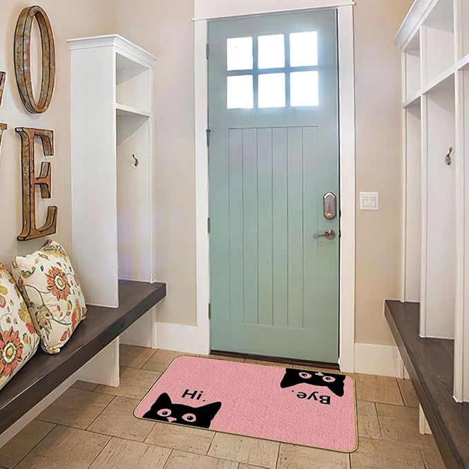 Pink welcome cat doormat with black cat faces and “Hi” text, rectangle border