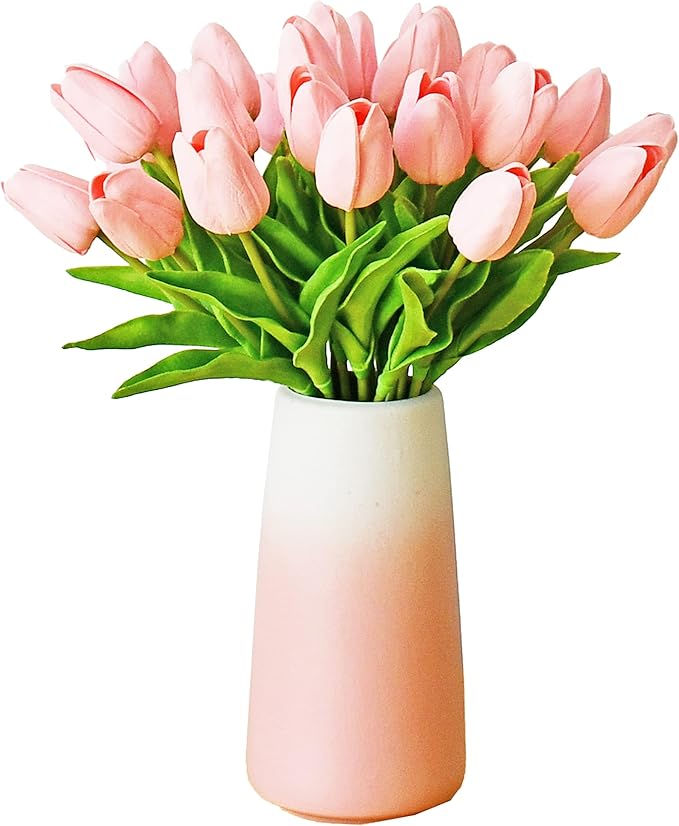 Light pink faux tulip bouquet in gradient pink vase with green stems