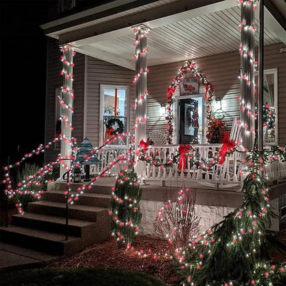 Red and white mini LED string lights draped along outdoor steps and railing