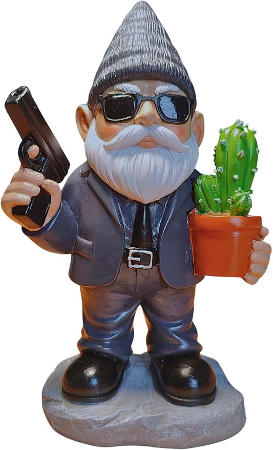 Resin hitman-style gnome statue with dark blue suit, sunglasses, white beard, holding pistol