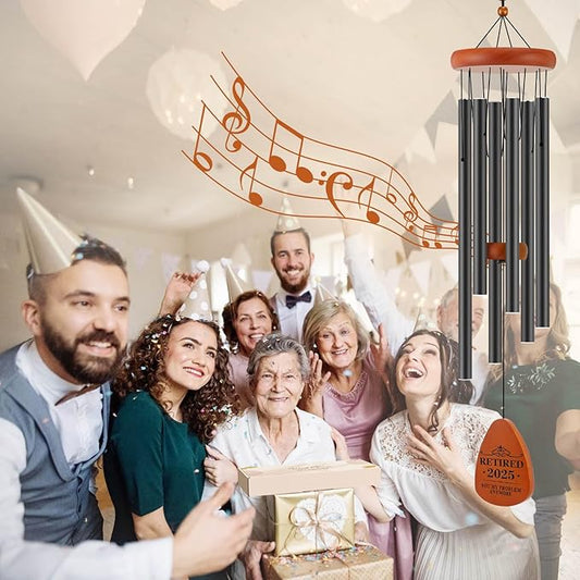 Orange wind chime with “Retired 2025” plaque and black hanging tubes