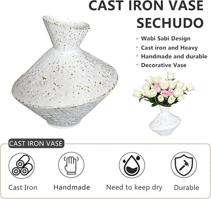 White hammered cast iron vase with angled neck, speckled finish, shown with flowers