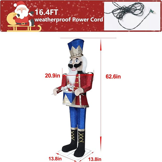 Pre-lit nutcracker soldier figure with blue hat, red coat, and connected power cord