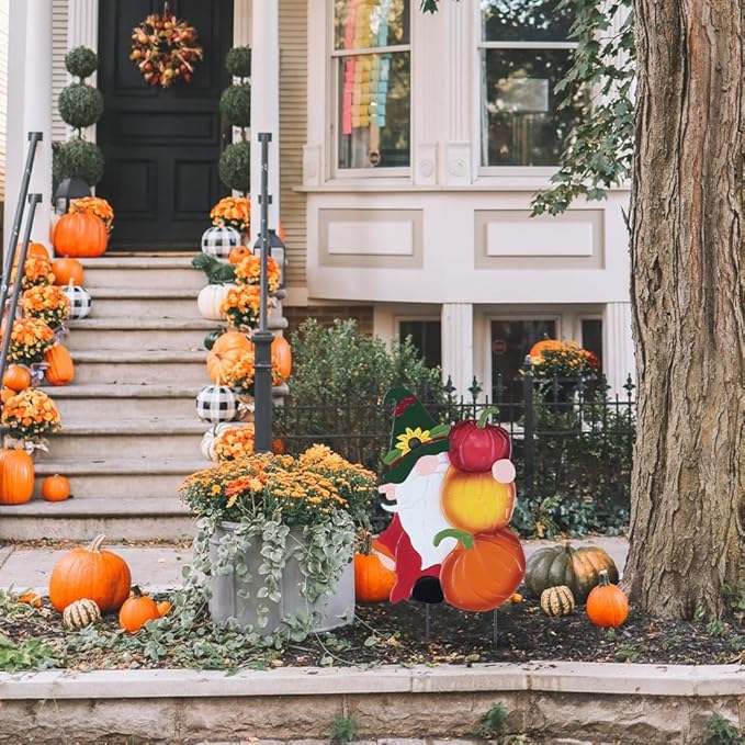 Metal garden gnome stake decoration with pumpkins in orange, red, yellow and green accents