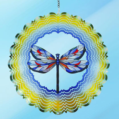 Hanging dragonfly wind spinner centered on blue sky, blue/red wings with scalloped ring