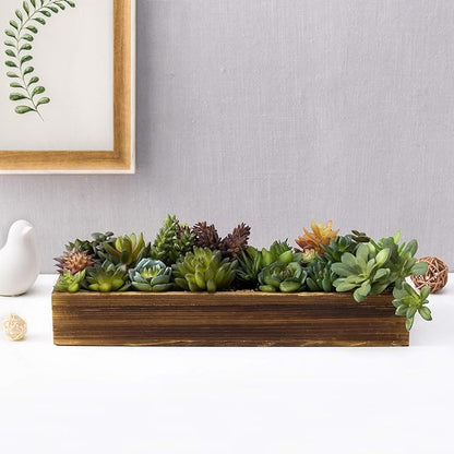 Long rustic brown wooden planter with faux succulents, mixed green and dark purple leaves
