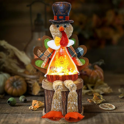 Light-up plush turkey doll with top hat, patterned vest, glowing orange chest, orange feet