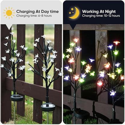 Solar butterfly garden lights on black stakes with multicolor glow for night use