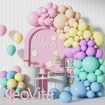 Pastel balloon arch garland with pink, beige, lavender, yellow, and blue balloon clusters