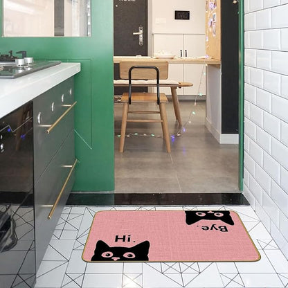 Pink welcome cat doormat with black cat faces and “Hi/Bye” text, flat rectangle