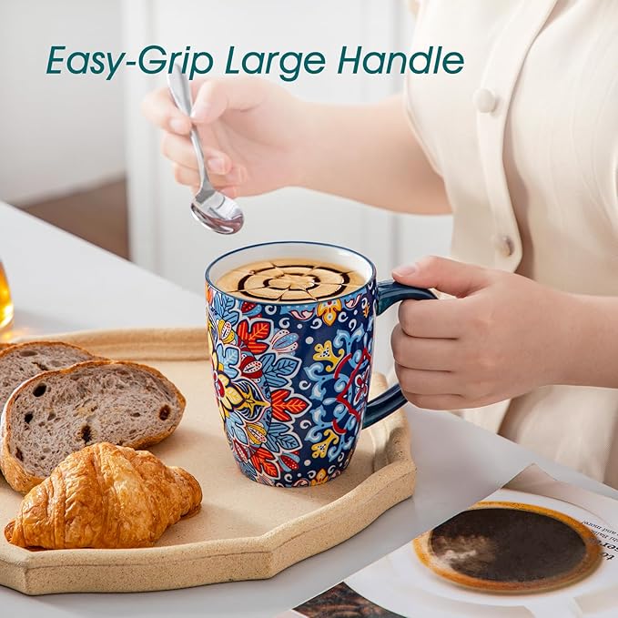 Large ceramic coffee mug with colorful boho pattern and easy-grip handle being filled