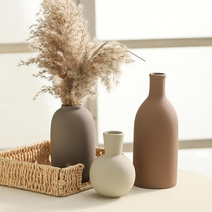Set of 3 ceramic vases with matte look: cream round, terracotta tall, dark gray bottle