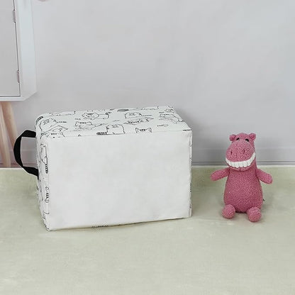 Cat-printed rectangular canvas storage bin with handles next to a plush toy