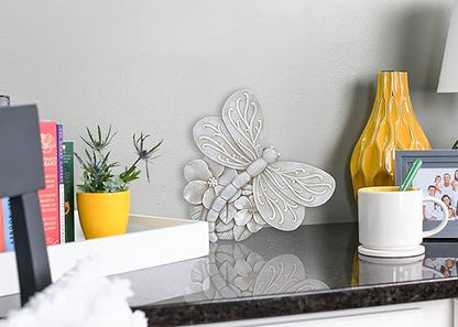 Grey dragonfly cast resin stepping stone with layered petal texture and raised wings
