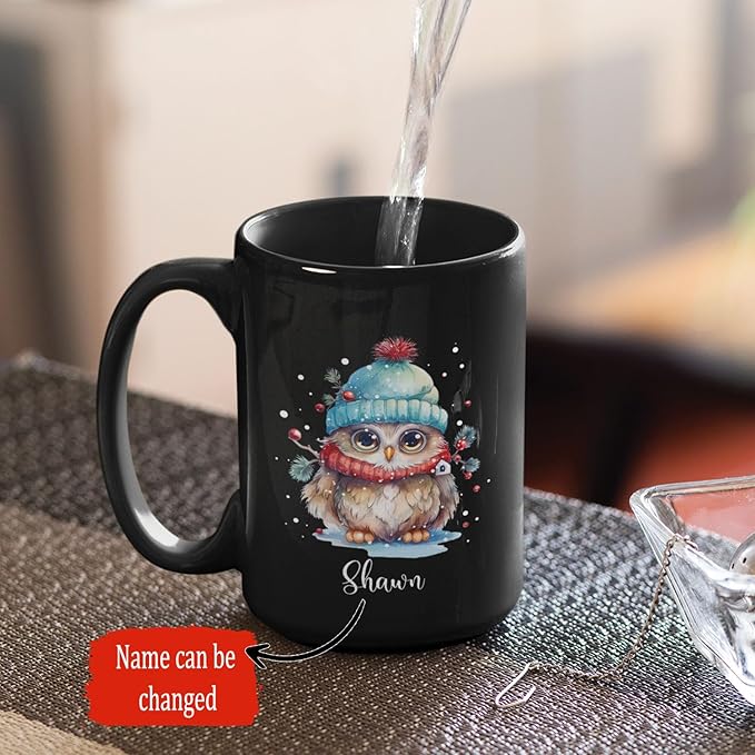 Black ceramic coffee mug with winter owl graphic and 'Shawn' name, left handle
