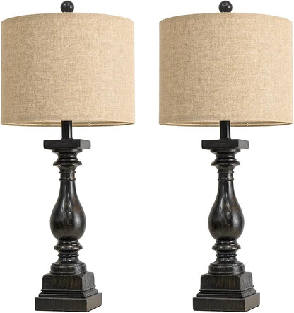 Pair of farmhouse table lamps with beige fabric shades and dark black turned bases