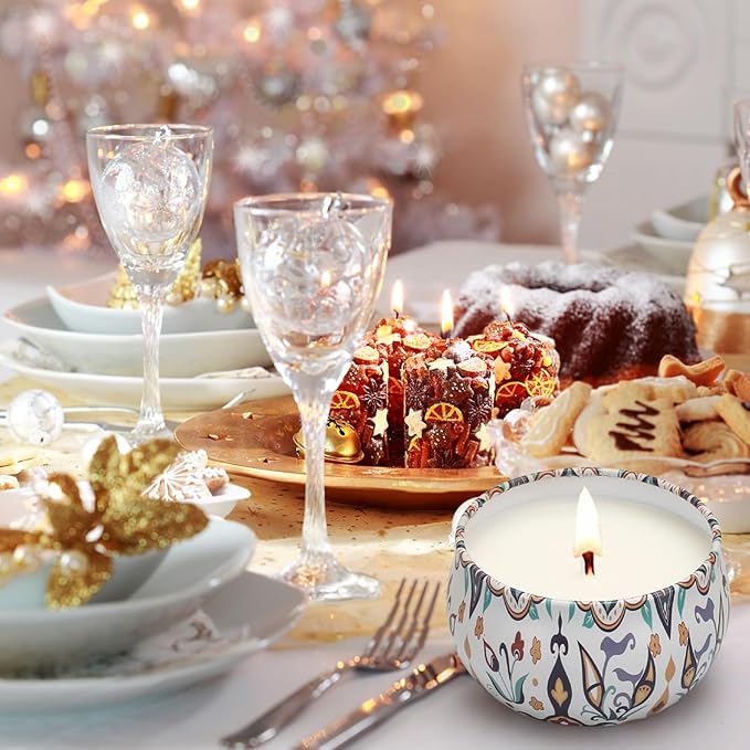 Patterned ceramic jar candle with a lit wick on a decorative table, gift-ready style