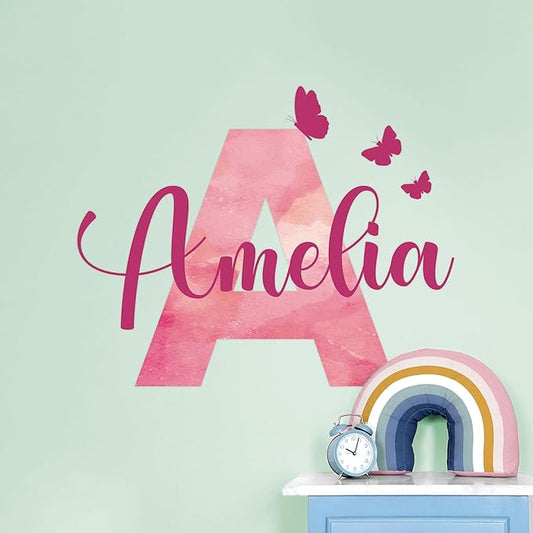 Pink watercolor letter A name wall decal with butterflies and cursive script