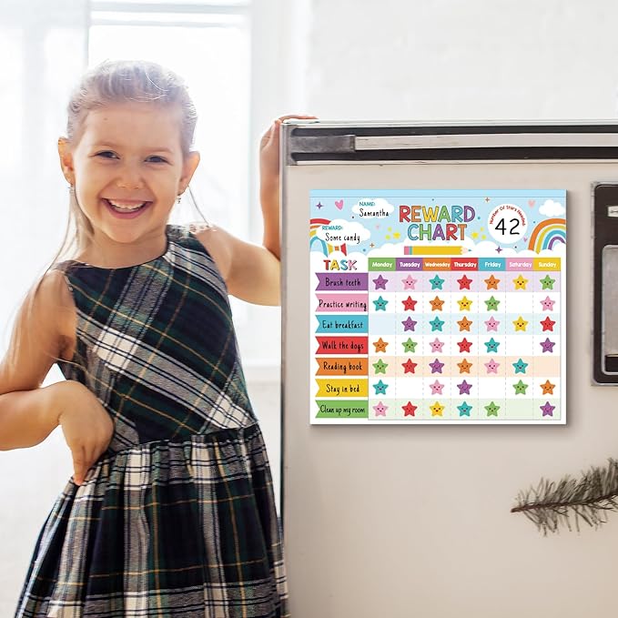 Child holding a kids reward chart on a magnetic board with task list and stars