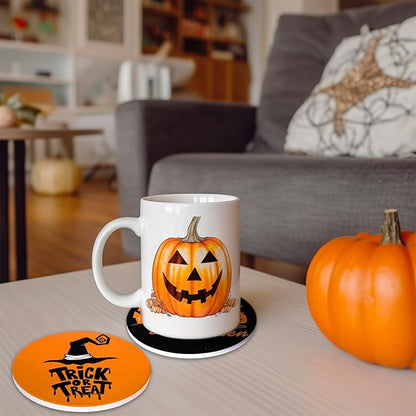 White mug resting on an orange-and-black Halloween ceramic coaster with cork backing