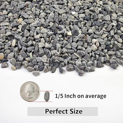 Gray polished stone gravel, small pebbles with a few light stones, loose pile