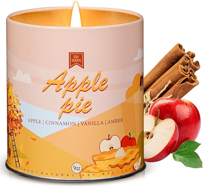 Soy scented candle in pink jar with apple pie label and lit wick