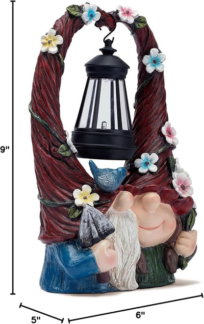 Resin gnome couple figurine with solar lantern; 6" wide x 9" tall dimensions