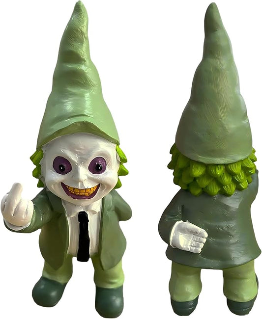 Green garden gnome statue with white skull face, purple eyes, waving fist