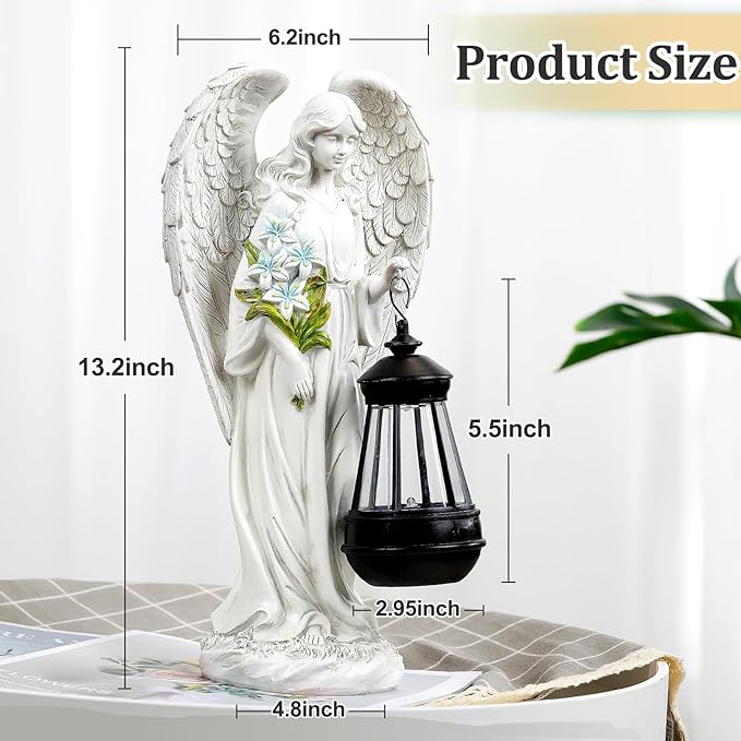 White angel solar garden statue with bouquet detail and black lantern