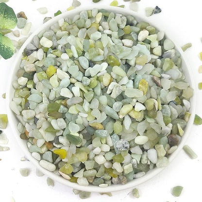 Light green and white polished stone pebbles, natural jade-colored gravel mix