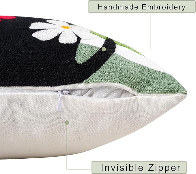 Embroidered pillow cover detail with invisible zipper and black cat floral pattern