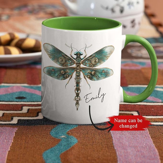 White ceramic mug with green interior and handle, teal steampunk dragonfly, Emily